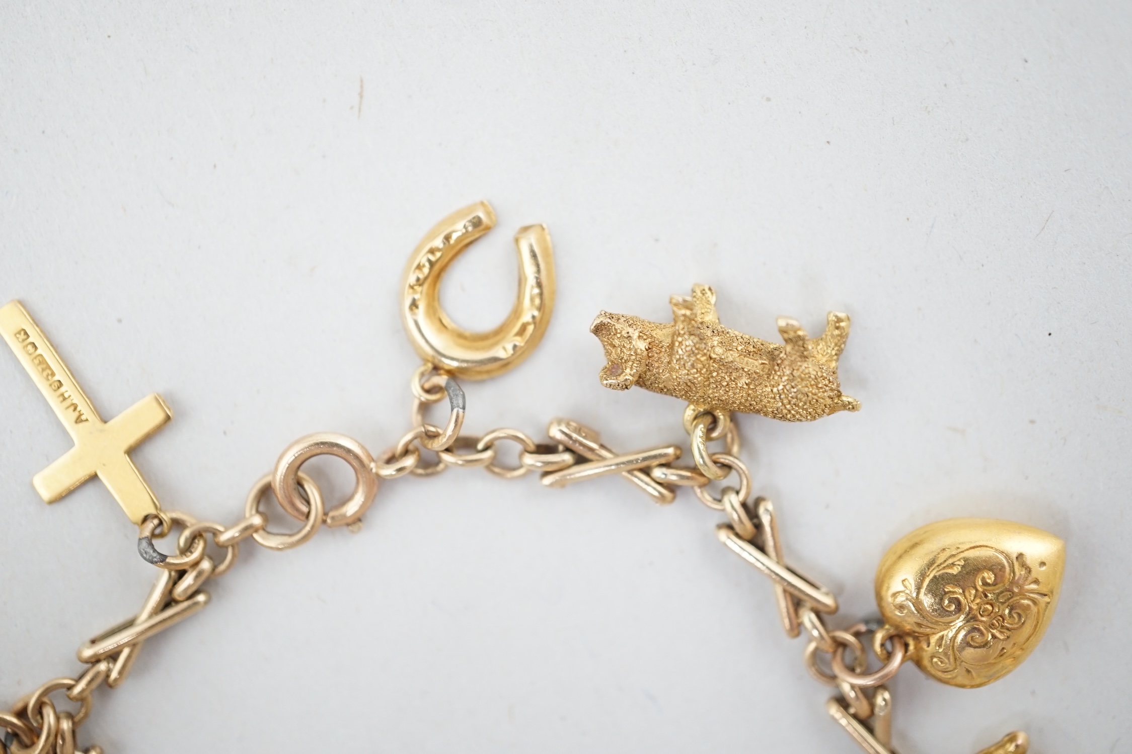 A 9ct gold charm bracelet